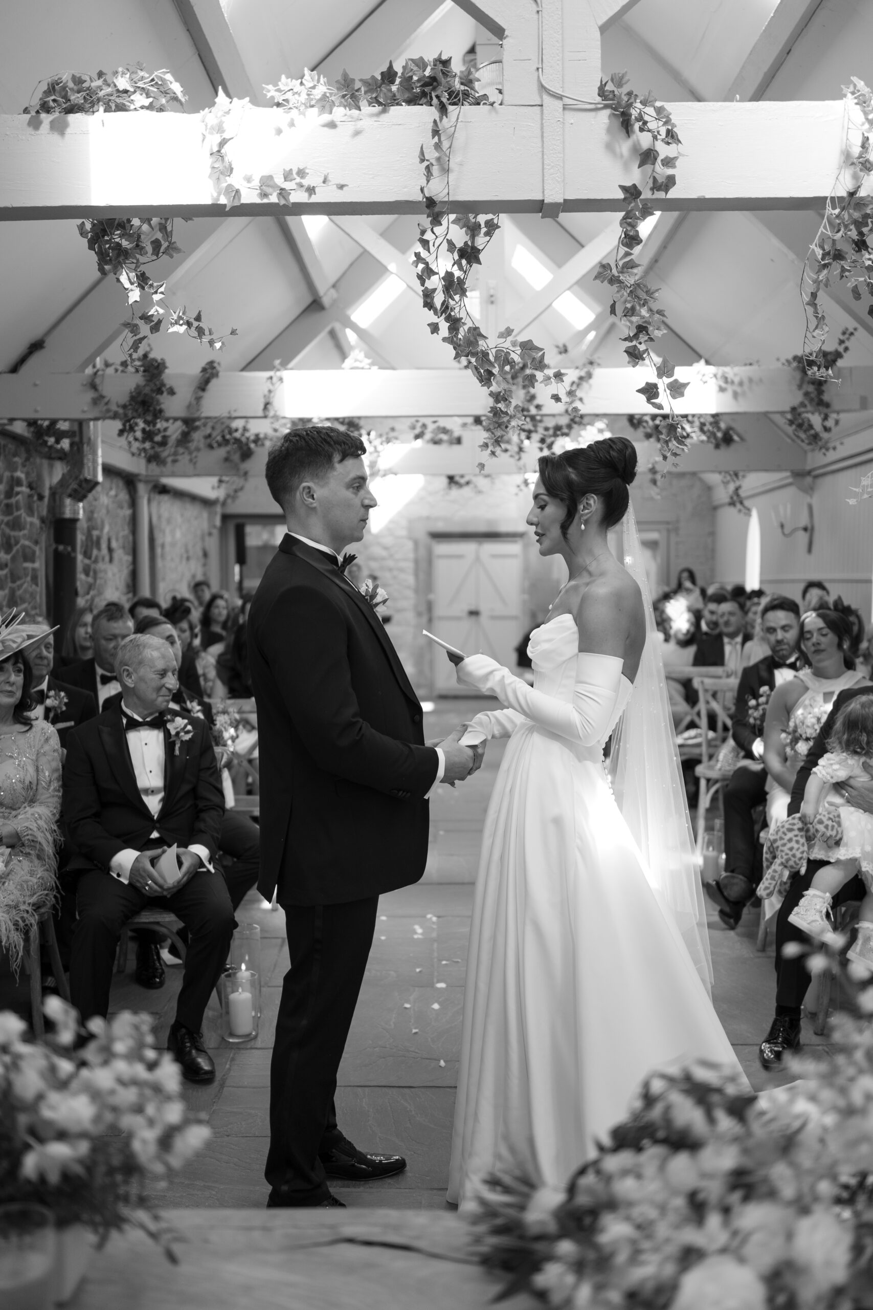 Rachel reading her vows to her husband.